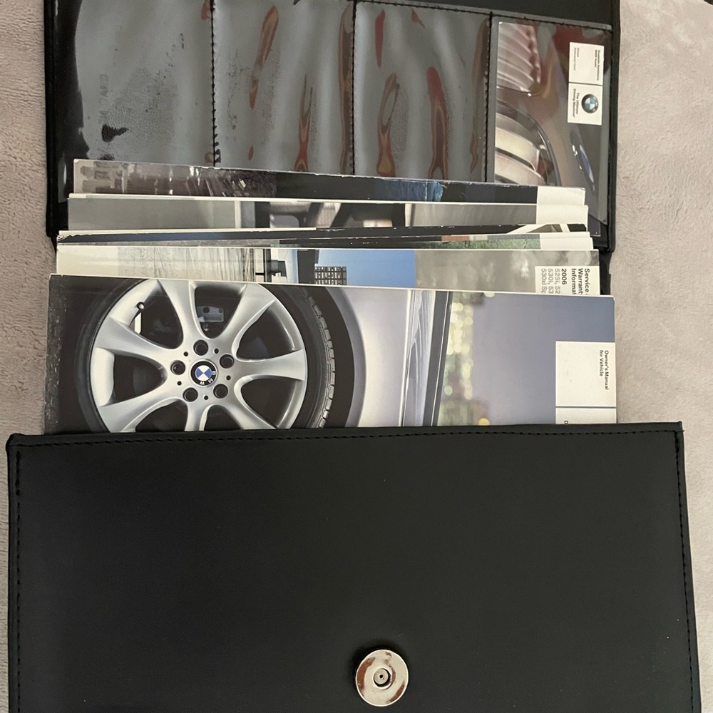BMW e60 owners manual and case